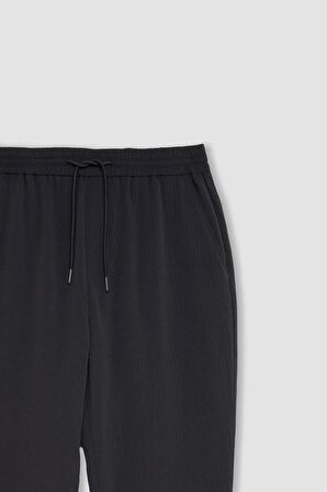 DeFacto Relax Fit Rahat Kesim Düz Paça Krinkıl Yazlık Kumaş Pantolon C3930AX24SMAR15