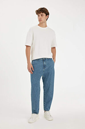 Relaxed Slouchy Fit Havuç Kalıp Normal Bel Daralan Paça Jean Kar Yıkamalı Pantolon