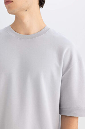DeFacto Loose Fit Bisiklet Yaka Kısa Kollu Ağır Kumaş Basic Düz Tişört B4844AX24AUGR253