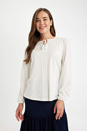 DeFacto Regular Fit Bisiklet Yaka Bağlamalı Flamlı Pamuk Uzun Kollu Tişört D6457AX24AUER105