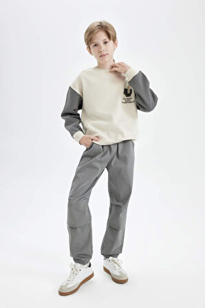 DeFacto Erkek Çocuk Bağcıklı Beli ve Paçası Lastikli Cepli Jogger Gabardin Pantolon C7577A824WNKH401