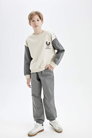 DeFacto Erkek Çocuk Bağcıklı Beli ve Paçası Lastikli Cepli Jogger Gabardin Pantolon C7577A824WNKH401