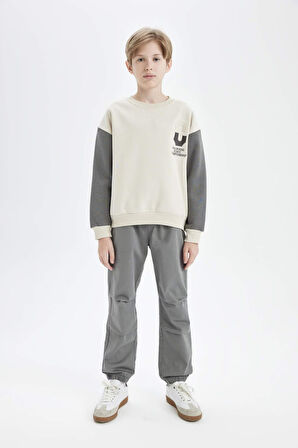 DeFacto Erkek Çocuk Bağcıklı Beli ve Paçası Lastikli Cepli Jogger Gabardin Pantolon C7577A824WNKH401