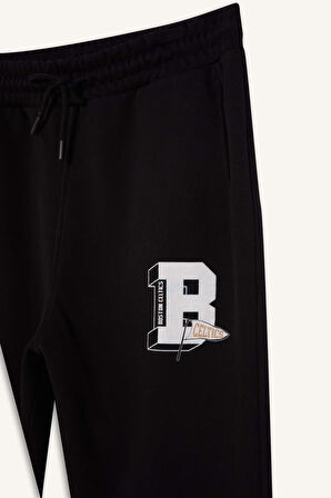 DeFactoFit NBA Boston Celtics Jogger Eşofman Altı Standart Fit Beli Bağcıklı Cepli Lastikli Paça D1562AX24WNBK81