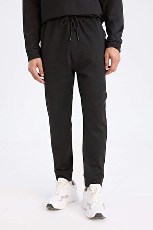 DeFactoFit Standart Fit Sporcu Jogger Eşofman Altı Standart Paça Skuba Dalgıç Kumaş D7308AX25SPBK81