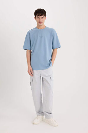 DeFacto Boxy Fit Bisiklet Yaka Ütü Gerektirmeyen Nefes Alabilen Baskılı Kısa Kollu Ağır Kumaş Tişört D5518AX25SPBE299