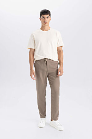 DeFacto Yazlık Jogger Pantolon Slim Fit Dar Kesim Beli Bağcıklı Cepli Düz Paça D8638AX24AUBN586