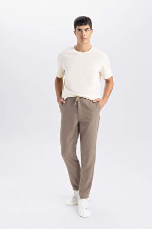 DeFacto Yazlık Jogger Pantolon Slim Fit Dar Kesim Beli Bağcıklı Cepli Düz Paça D8638AX24AUBN586