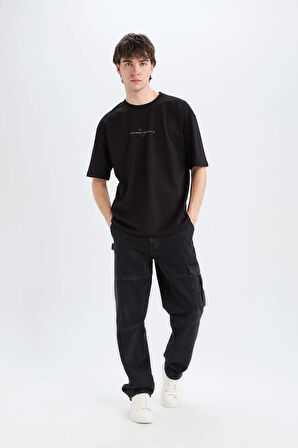 DeFacto %100 Pamuk Vikings Valhalla Oversize Geniş Kalıp Bisiklet Yaka Sırt Baskılı Kısa Kollu Tişört A6308AX25SPBK81