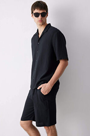 DeFacto %100 Pamuk Relax Fit Müslin Cepli Basic Düz Bermuda Şort C7589AX25SMBK81