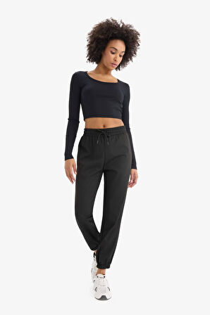 DeFactoFit Standart Fit Çift Cepli Paçası Lastikli Standart Boy Sporcu Eşofman Altı A4557AX25SPBK81