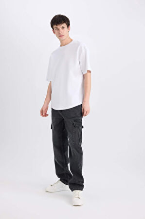 DeFacto %100 Pamuk Relax Fit Rahat Kesim Geniş Paça Kargo Cepli Siyah Jean Pantolon E6694AX25SPNM40