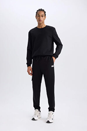 DeFactoFit NBA Brooklyn Nets Jogger Eşofman Altı Standart Fit Cepli Skuba Dalgıç Kumaş Beli Bağcıklı Lastikli Paça D8677AX25SPBK81