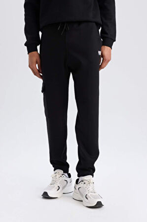 DeFactoFit NBA Brooklyn Nets Jogger Eşofman Altı Standart Fit Cepli Skuba Dalgıç Kumaş Beli Bağcıklı Lastikli Paça D8677AX25SPBK81