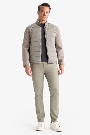 Slim Fit Dar Kesim Dik Yaka Lastikli ve Fermuarlı Su Geçirmez Mont