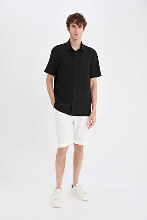DeFacto Regular Fit Polo Yaka Krinkıl Yazlık Kısa Kollu Siyah Gömlek E1223AX25SMBK27