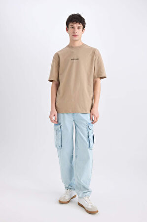 DeFacto One Piece Boxy Fit Bisiklet Yaka Sırt Baskılı Kısa Kollu Tişört D5619AX25SPBG73