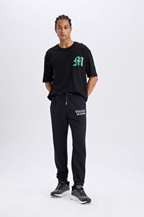 DeFactoFit NBA Milwaukee Bucks Kalın Jogger Eşofman Altı Standart Fit Cepli Beli Bağcıklı Lastikli Paça D6692AX25SPBK82