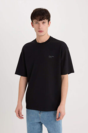 DeFacto Boxy Fit Bisiklet Yaka Ütü Gerektirmeyen Nefes Alabilen Baskılı Kısa Kollu Ağır Kumaş Tişört D5507AX25SPBK81