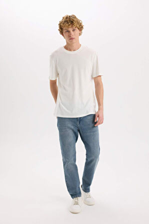 DeFacto Slim Tapered Fit Dar Kalıp Normal Bel Daralan Paça Jean Pantolon E3336AX25SPNM84