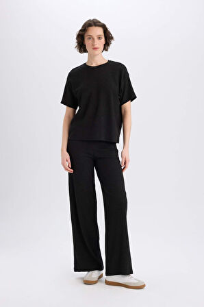 DeFacto Relax Fit Bisiklet Yaka Basic Düz Bürümcük Kısa Kollu Siyah Tişört C3843AX25SPBK81