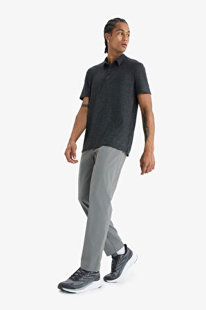 DeFactoFit Slim Fit Dar Kesim Standart Paça Esnek Multifonksiyonel Dokuma Sporcu Pantolon D9247AX25SPGR83