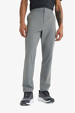 DeFactoFit Slim Fit Dar Kesim Standart Paça Esnek Multifonksiyonel Dokuma Sporcu Pantolon D9247AX25SPGR83