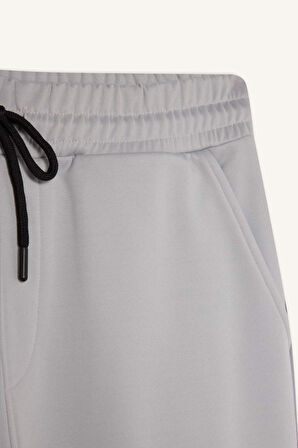DeFactoFit Sporcu Jogger Eşofman Altı Standart Fit Üç Cepli Beli Bağcıklı Lastikli Paça D3741AX24WNGR523