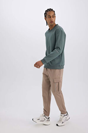 DeFactoFit Sporcu Jogger Eşofman Altı Standart Fit Üç Cepli Beli Bağcıklı Lastikli Paça D3741AX24WNBG73