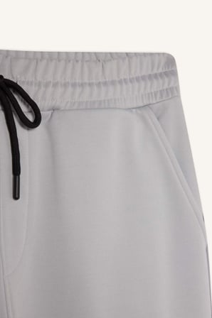 DeFactoFit Sporcu Jogger Eşofman Altı Standart Fit Üç Cepli Beli Bağcıklı Lastikli Paça D3741AX24WNGR211