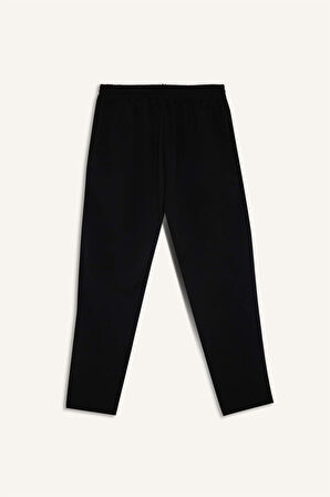 DeFacto Krep Pantolon Carrot Fit Basic Düz Beli Lastikli Dar Paça Cepli D5950AX24WNBK81