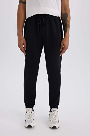DeFactoFit Slim Fit Sporcu Jogger Eşofman Altı Dar Kesim Skuba Dalgıç Kumaş Standart Paça Beli Bağcıklı Lastikli Paça Z9112AZ25SPBK81