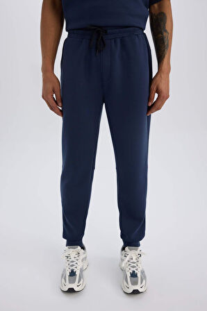 DeFactoFit Slim Fit Sporcu Jogger Eşofman Altı Dar Kesim Skuba Dalgıç Kumaş Standart Paça Beli Bağcıklı Lastikli Paça Z9112AZ25SPNV201