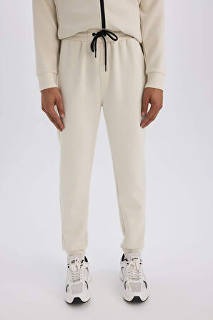 DeFactoFit Slim Fit Sporcu Jogger Eşofman Altı Dar Kesim Skuba Dalgıç Kumaş Standart Paça Beli Bağcıklı Lastikli Paça Z9112AZ25SPBG721