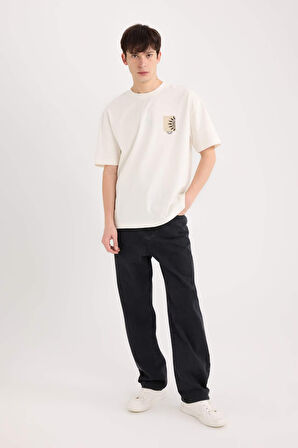 DeFacto %100 Pamuk Oversize Geniş Kalıp Bisiklet Yaka Sırt Baskılı Kısa Kollu Tişört B5813AX25SPER105