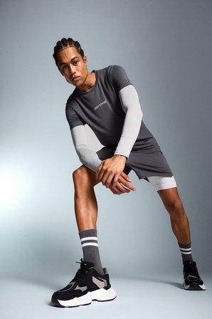 DeFacto Slim Fit Dar Kesim Sporcu Taytlı Şort E2760AX25SMAR58