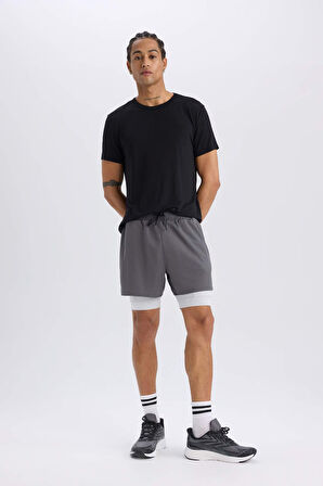DeFactoFit Slim Fit Dar Kesim Sporcu Penye Taytlı Şort