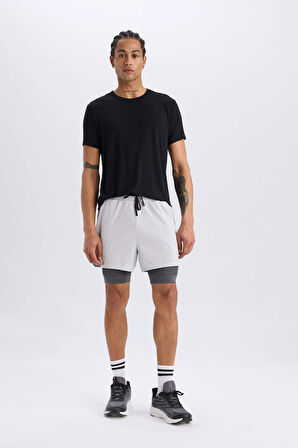 DeFactoFit Slim Fit Dar Kesim Sporcu Penye Taytlı Şort