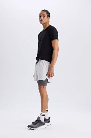 DeFactoFit Slim Fit Dar Kesim Sporcu Penye Taytlı Şort