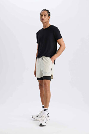 DeFactoFit Slim Fit Dar Kesim Sporcu Penye Taytlı Şort