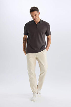 DeFacto Regular Fit Polo Yaka Yarım Fermuarlı Dokulu Kısa Kollu Tişört D7227AX25SPKH190