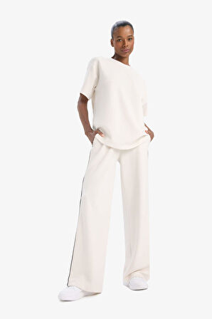 DeFactoFit Oversize Geniş Kalıp Bisiklet Yaka Sporcu Modal Kısa Kollu Tişört D7127AX25SPER218