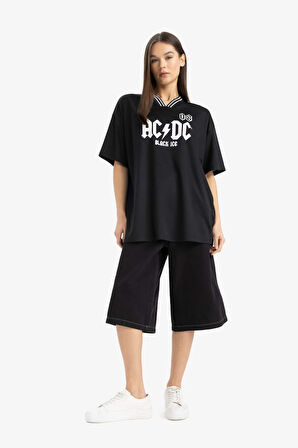 DeFacto Coool AC/DC Oversize Geniş Kalıp V Yaka Sırt Baskılı Kısa Kollu Tişört E6137AX25SMBK81