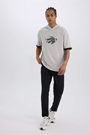 DeFactoFit Sporcu Jogger Eşofman Altı Slim Fit Dar Kesim Standart Paça Skuba Dalgıç Kumaş Beli Lastikli Düz Paça E3930AX24WNBK81