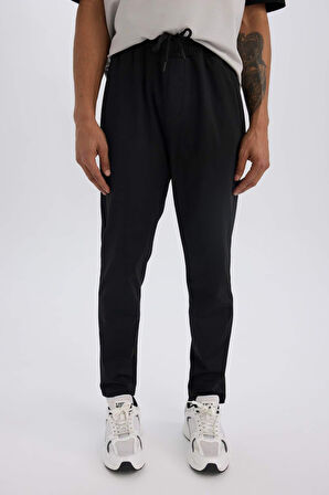 DeFactoFit Sporcu Jogger Eşofman Altı Slim Fit Dar Kesim Standart Paça Skuba Dalgıç Kumaş Beli Lastikli Düz Paça E3930AX24WNBK81