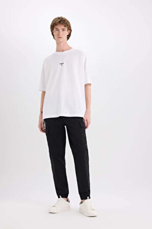 DeFacto %100 Pamuk Loose Fit Bisiklet Yaka Sırt Baskılı Kısa Kollu Tişört D7356AX25SPWT34