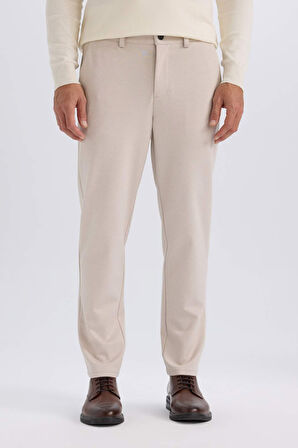 DeFacto Jogger Düz Paça Her Yöne Esneyen Yazlık Kumaş Pantolon T6317AZ25SPBG609