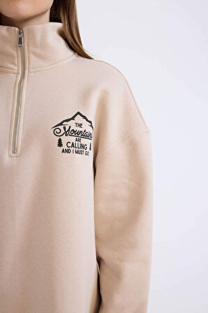 DeFacto Relax Fit Yarım Fermuarlı Dik Yaka Baskılı İçi Yumuşak Tüylü Kalın Sweatshirt Tunik E5402AX24WNBG722
