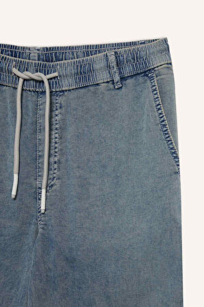 DeFacto Yazlık Wide Leg Geniş Kalıp Beli Lastikli Geniş Paça Jean Kar Yıkamalı Pantolon F2967AX25SPNM39