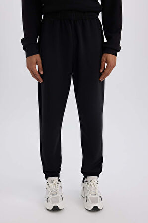 DeFactoFit Standart Fit Sporcu Jogger Eşofman Altı Skuba Dalgıç Kumaş Beli Bağcıklı Lastikli Paça D7525AX25SPBK81